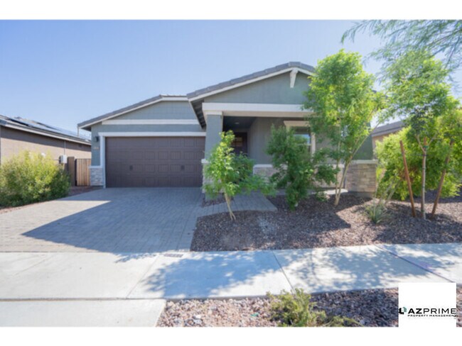 Foto del edificio - Introducing this delightful 4/3 Surprise Home with a Cozy Atmosphere and Comfortable Living Spaces!