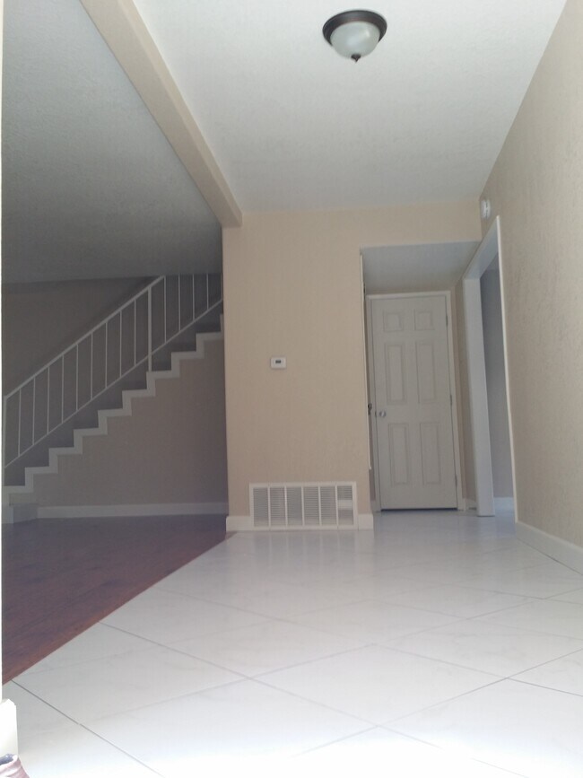 Part of Living Room + Hallway - 16582 Lorelei Ln