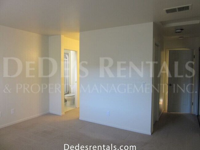Building Photo - Walkup Condominium in Rincon Valley Community