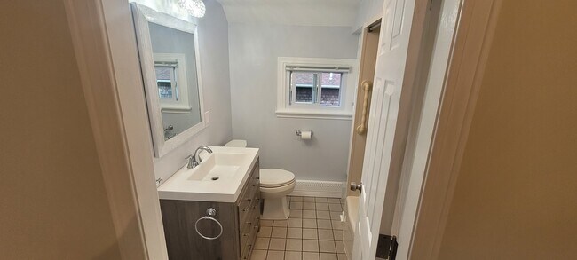 Updated bathroom with new vanity - 76 Goldsmith Ave