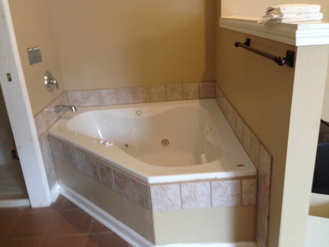 Building Photo - Studio apartments available at 3030 Pepper...