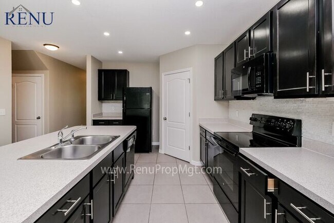 Building Photo - This Summer Special is Heating Up!: 50% of...