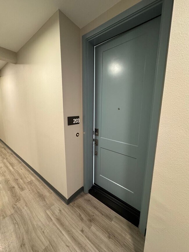 Building Photo - Brand New 1 bedroom, 1 bath Townhome with 2 car tandem garage for lease