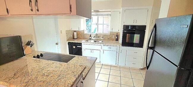 Granite tops in kitchen - 3793 E Saginaw Way
