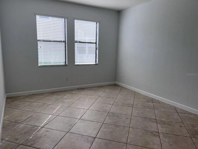 Building Photo - "Spacious 5-Bed Retreat with Elegant Hardwood & Granite Finishes in Tampa – 3 Full Baths & 3264 S...