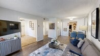 Located at 240 El Dorado Blvd in Houston, TX, this single-floor 2-bedroom, 1-bathroom home offers a thoughtfully arranged layout that maximizes every inch of its comfortable footprint. The open living and dining area serves as the heart of the home, featuring wood-style flooring, a textured ceiling, and a sliding glass door that fills the space with natural light and provides outdoor access. The galley-style kitchen is well-appointed with white shaker cabinetry, a gray subway tile backsplash, white countertops, and black appliances, offering ample storage and prep space. A dedicated laundry area adds everyday convenience. The spacious primary bedroom features plush carpeting, a ceiling fan, and a walk-in closet, creating a comfortable retreat. The second bedroom also offers carpeted floors, a ceiling fan, a large window, and closet space, making it equally versatile as a guest room or home office. The full bathroom is clean and functional, featuring a tub-shower combination, white cabinetry, and wood-style flooring. A hallway connects all rooms seamlessly, contributing to the home's efficient and cohesive flow. Neutral tones and consistent finishes throughout lend the space a modern, move-in-ready appeal.