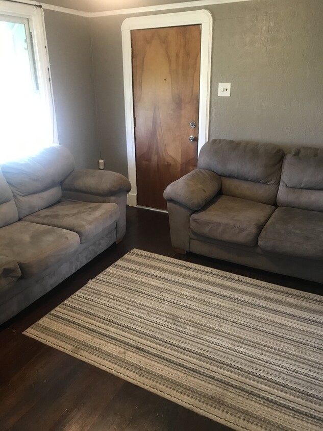 Living room pictured from hallway - 704 Avenue G