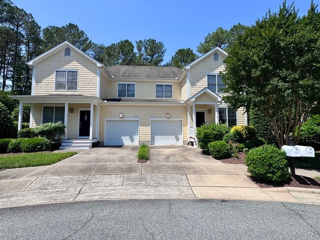 Photo - Beautifully maintained townhome on a priva...