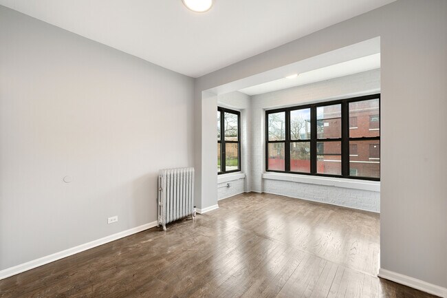 Building Photo - 7654 S Marquette Ave