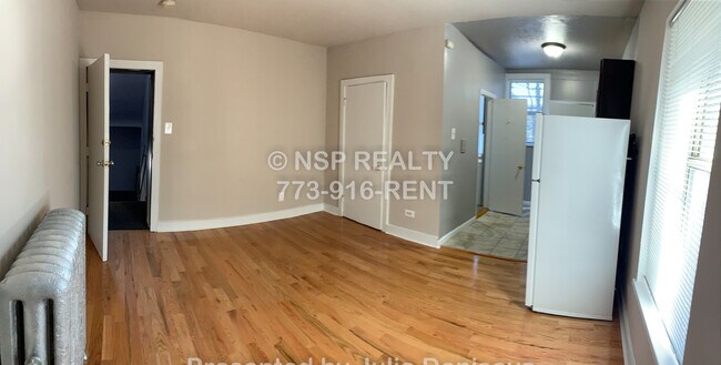 Foto del edificio - 5662 N Ridge Ave
