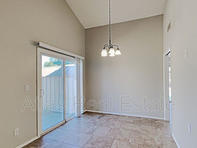 Building Photo - 9855 N 56th Dr