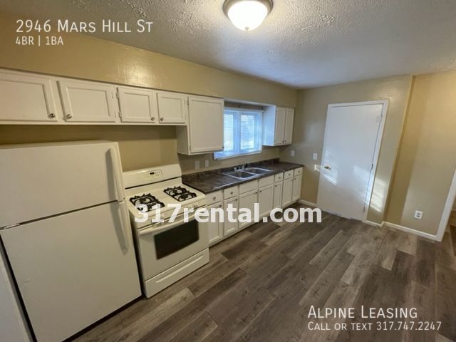 Building Photo - MARS HILL updated kitchen with lots of cab...
