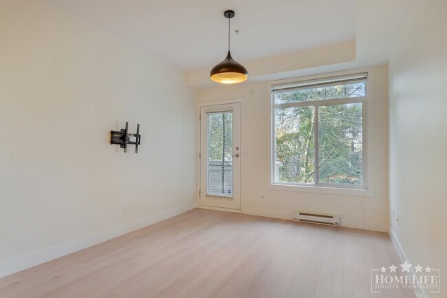 Building Photo - Bright & Updated 1-Bedroom Condo in the Heart of Surrey City Centre