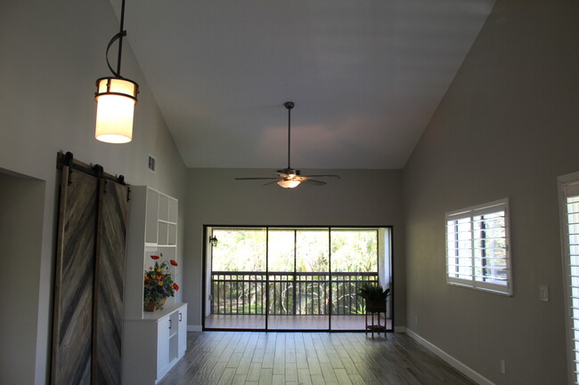 From the Kitchen, looking at living room and lanai - 5208 Harpers Croft