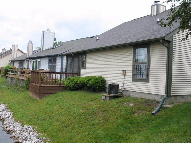 Back of house w/ deck view - 4155 Eagle Cove W Dr