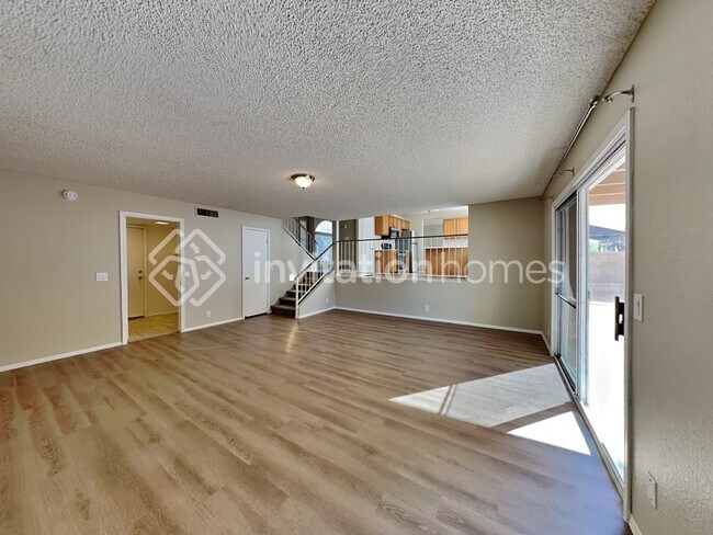 Building Photo - 8445 W Emile Zola Ave