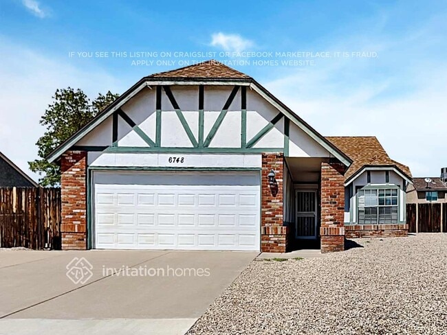 Building Photo - 6748 W Cinnabar Ave