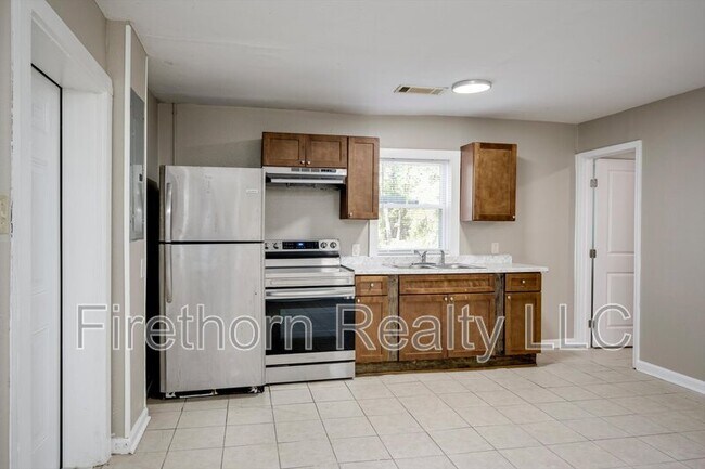 Foto del edificio - 2719B Meadowbrook Dr