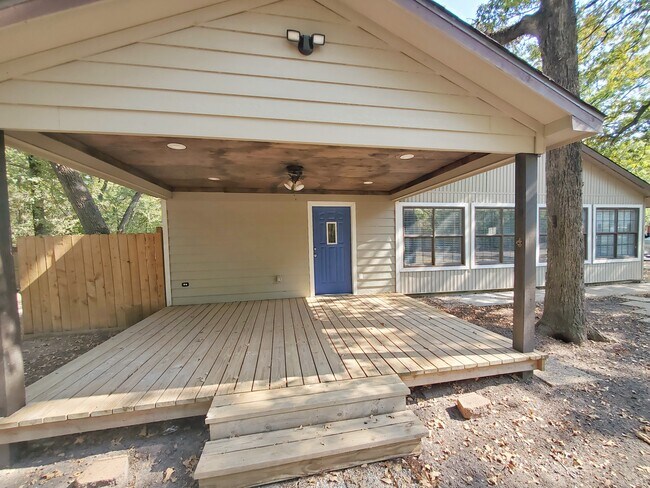 Secondary entrance with large covered porch - 28700 Gumwood Ct