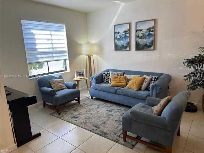 Building Photo - 3 br, 2.5 bath House - 10543 W 33rd Ct # 0 1