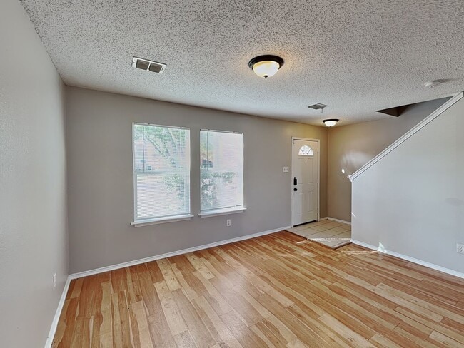 Building Photo - Corner Lot Charmer with Two-Story Deck and Bonus Game Room!