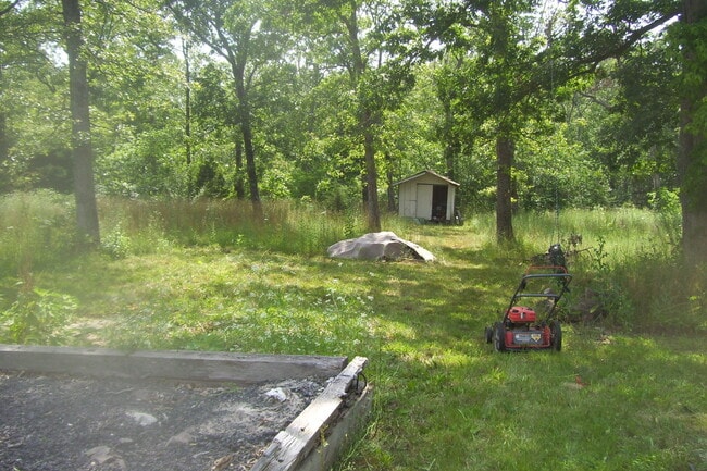 Building Photo - BISMARCK - 2BD/Fireplace/Metal Roof, Vinyl Siding/Iron Mt Lake ONLY - $399 MONTH / $695 DOWN