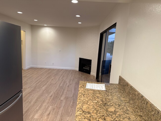 Living room view from kitchen - 10330 Riverside Dr