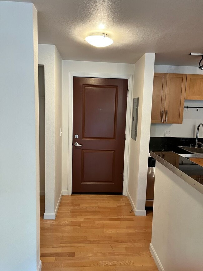 Building Photo - Great location, secure parking, controlled...