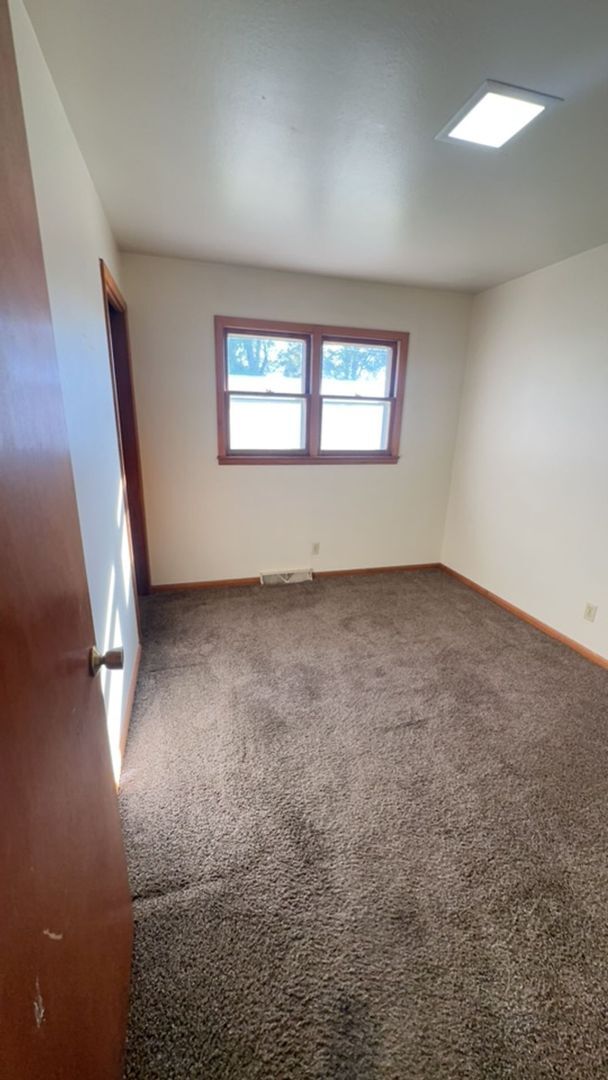 Foto del edificio - 3 Bedroom, 1 Bathroom House with attached Garage