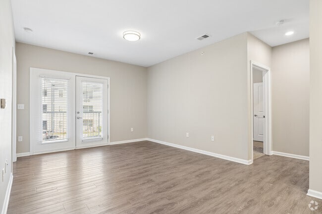 2BR, 2BA - 1,019SF - Living Room - The Foundry