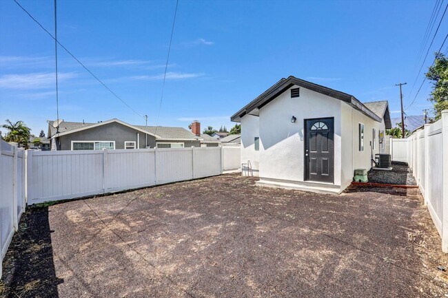 Building Photo - 9983 Vernon Ave