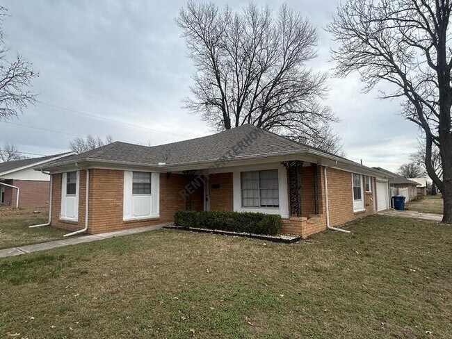 Building Photo - 9406 E 37th Ct