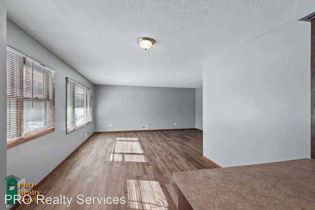 Building Photo - 3 br, 1.5 bath House - 8687 28th St N