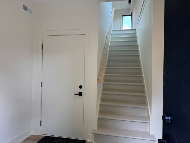Building Photo - Vaulted Ceilings & Hardwood Floors in This Charming Indianapolis L