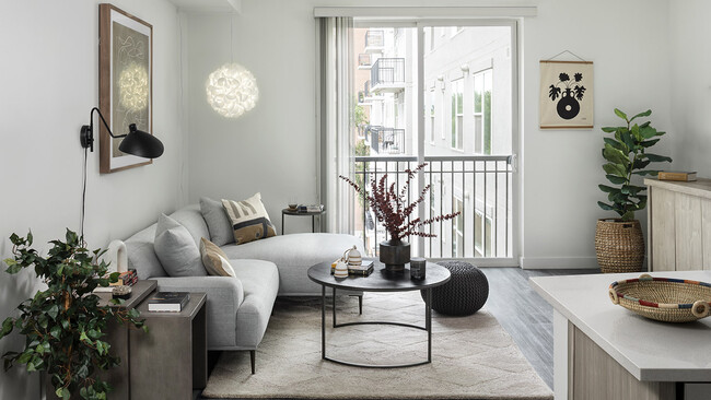 Apartment Living Room with wood floors. - Griffis Cheesman Park