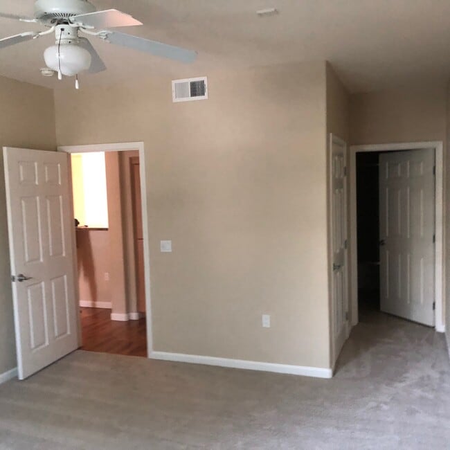master bedroom with walk in closet - 1101 S Main St