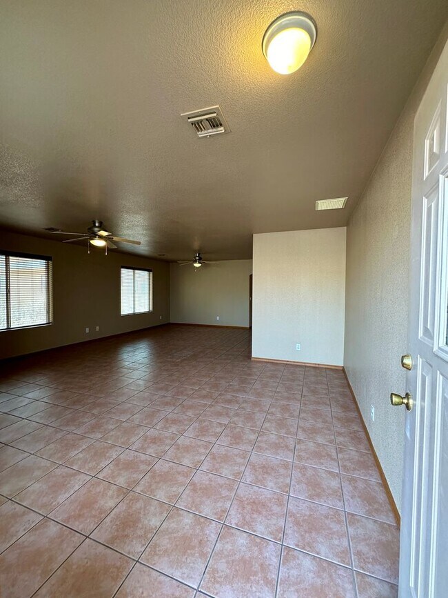 Building Photo - Long term - Unfurnished - Large home with ...