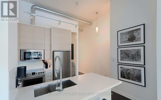 Photo du bâtiment - 380 Macpherson Ave