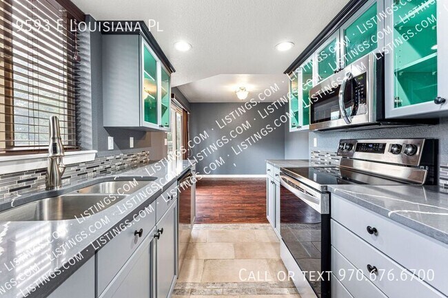 Building Photo - 9593 E Louisiana Pl