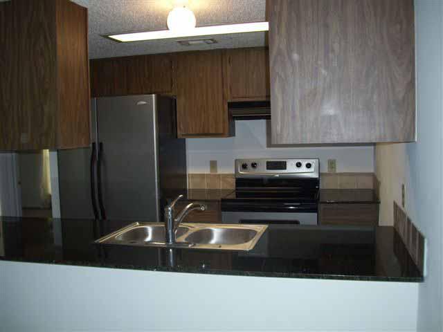 one bedroom kitchen - Ashley Oaks Apartments