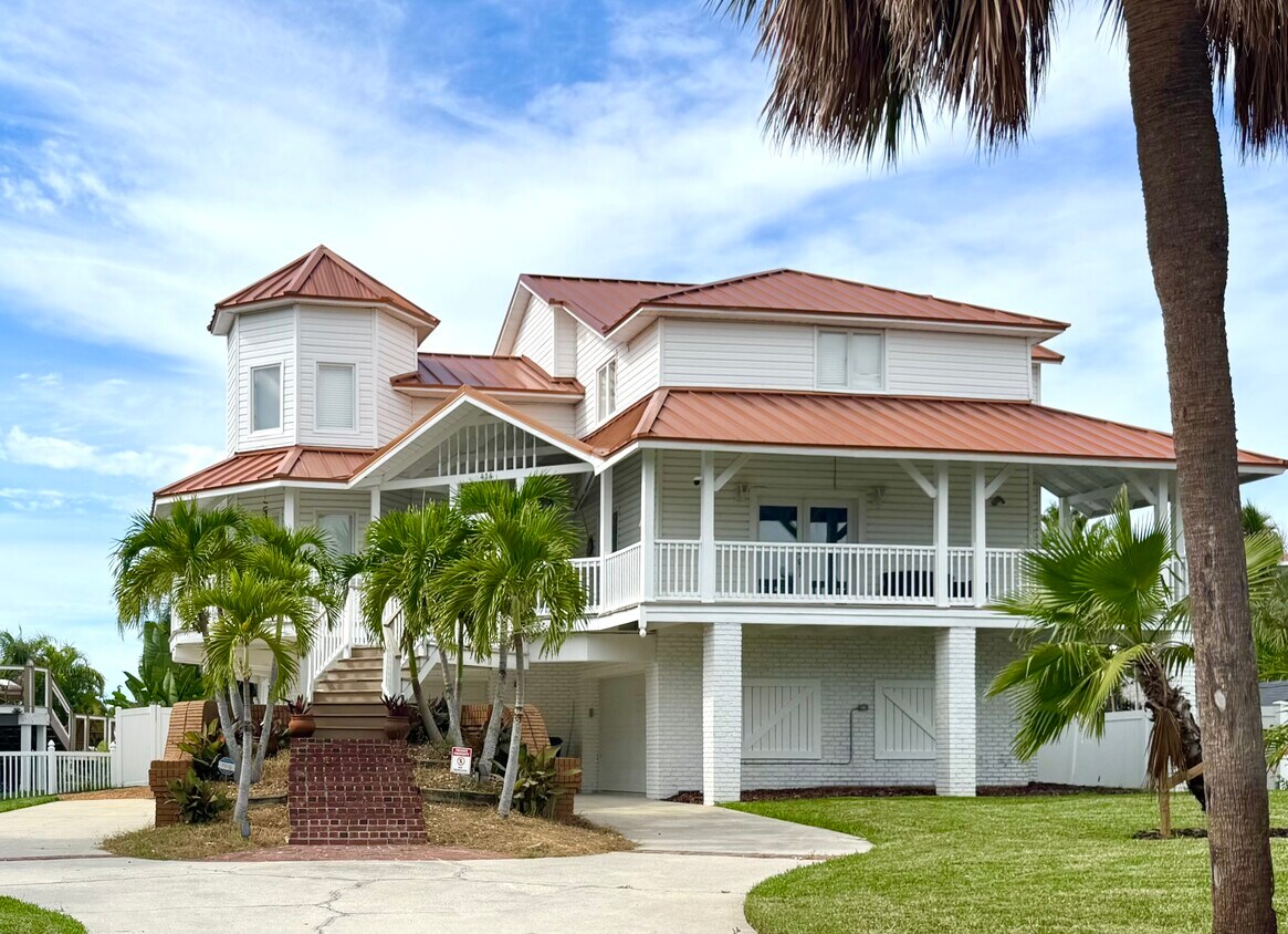 Key West Style with wraparound porch - 414 140th Ave E