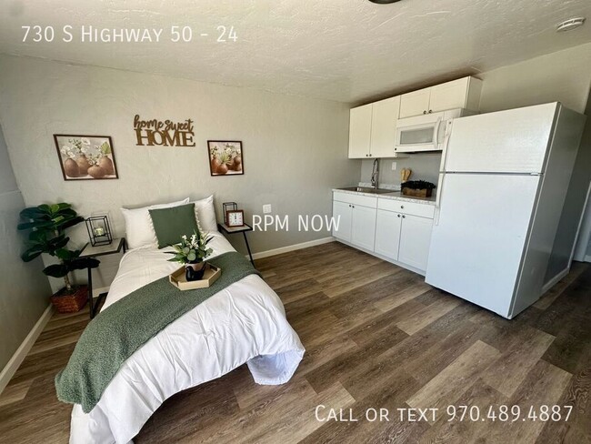 Building Photo - Updated Unit with Hard floors! Utilities i...