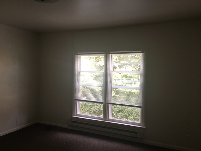 Upstairs Unit B Bedroom 1 - 210 S Fancher Ave