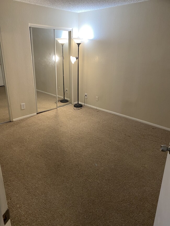 Master Bedroom with Dual Mirrored Closet Doors - 10655 Lemon Ave