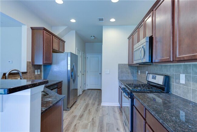 Building Photo - 4910 Breezewood Cir