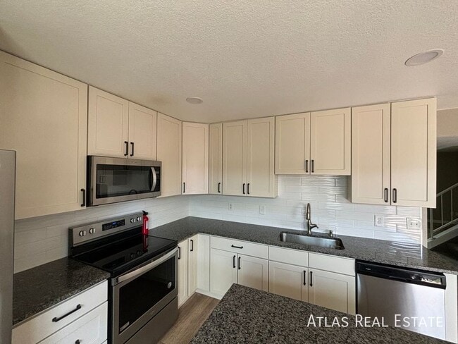 Building Photo - 12883 W Alameda Dr
