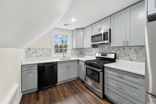 Building Photo - 74 Custer Ave