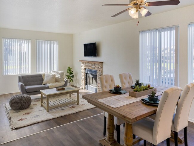 Living Room with Fireplace - Edgewater Isle Apartments and Townhomes