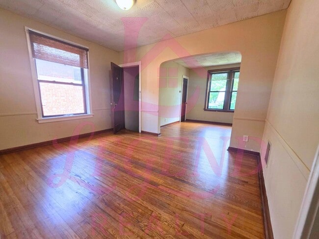 Building Photo - 4942 Tholozan Ave