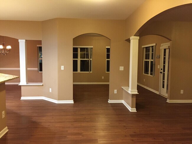 kitchen nook and sunroom in the back - 100 Pine Lakes Drive